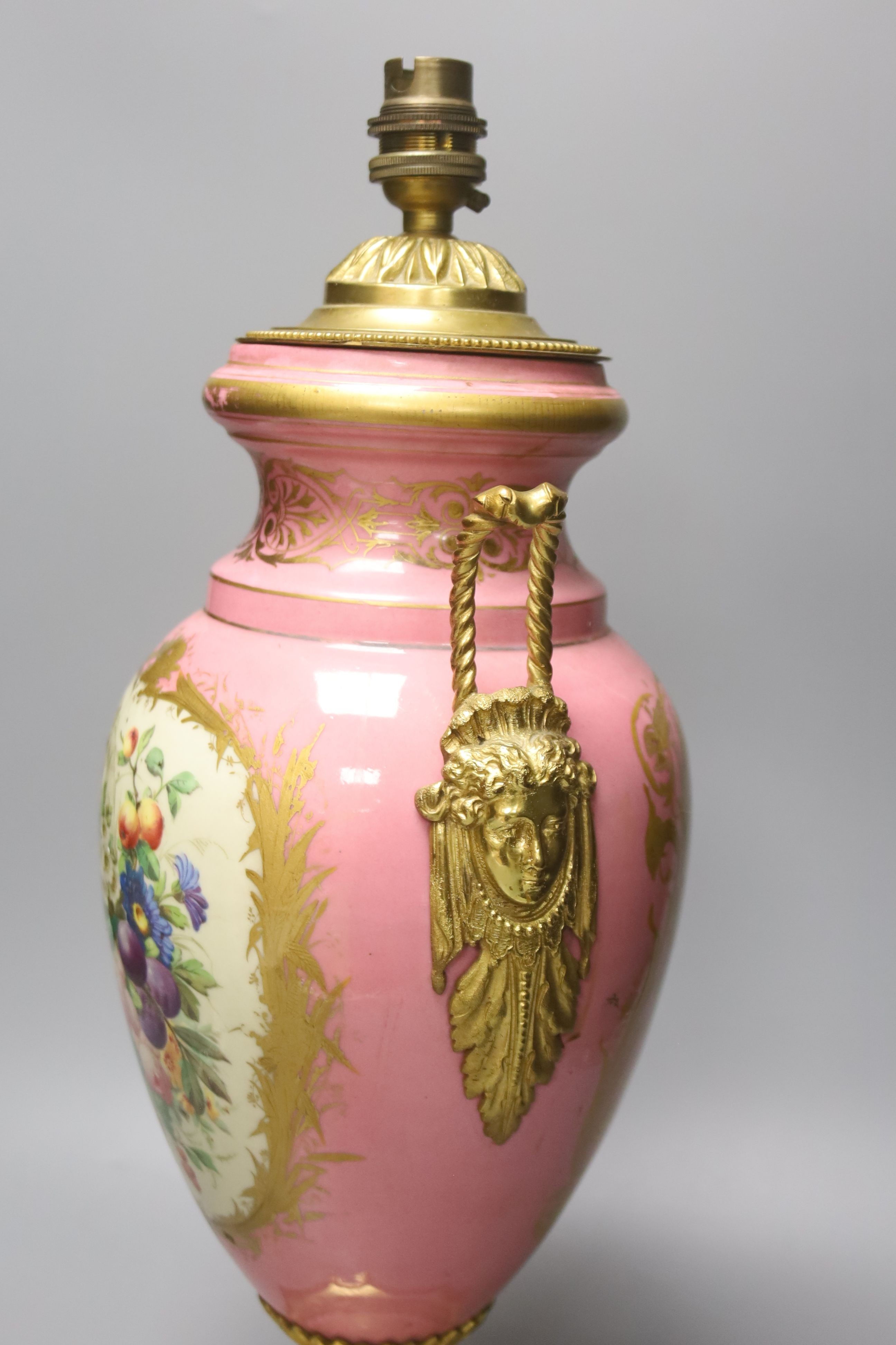 A large 19th century Sevres style porcelain and gilt metal mounted table lamp, 46cm